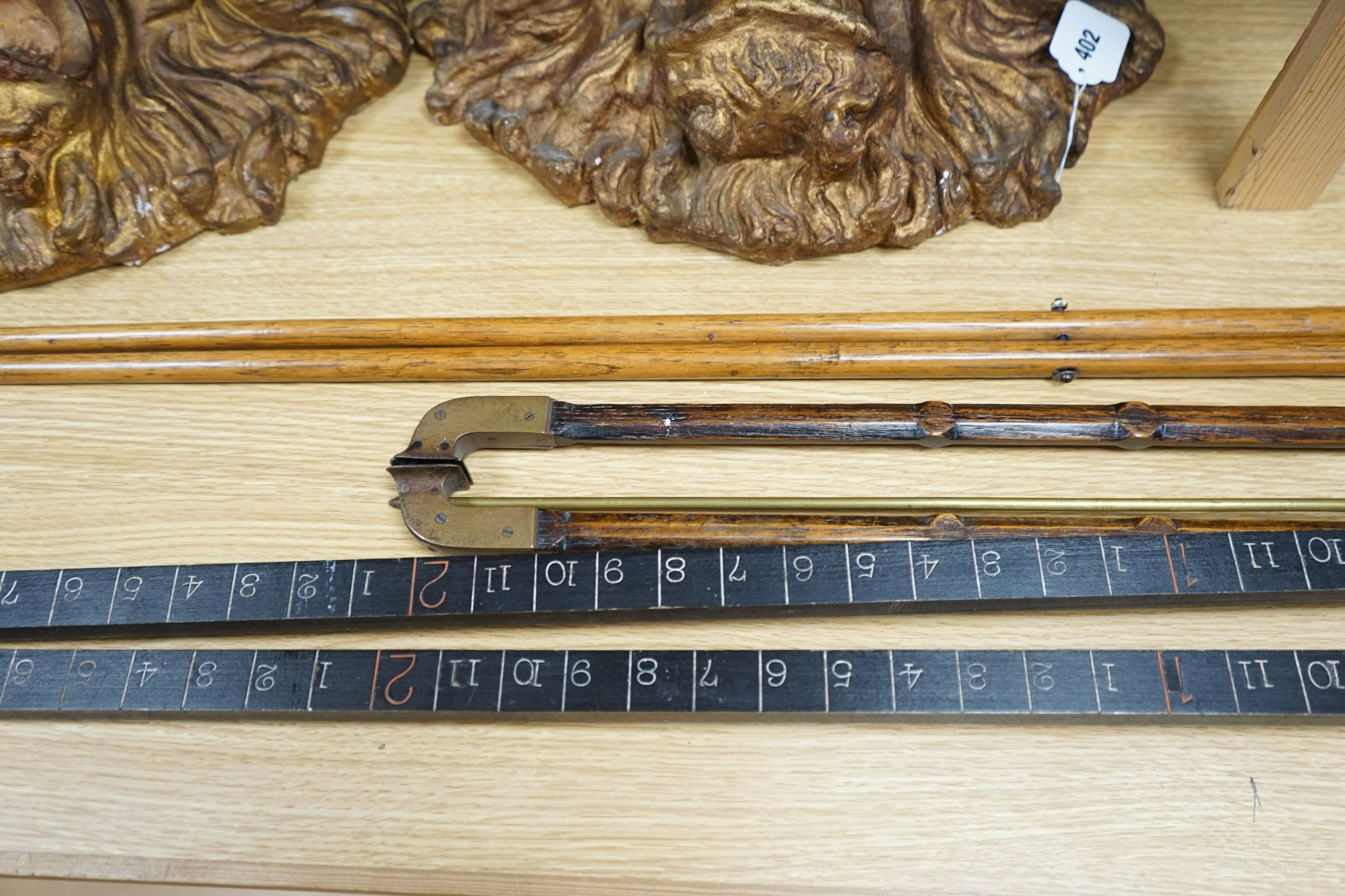 A pair of Bentley & Taylor rail measures together with other tools, longest 120cm